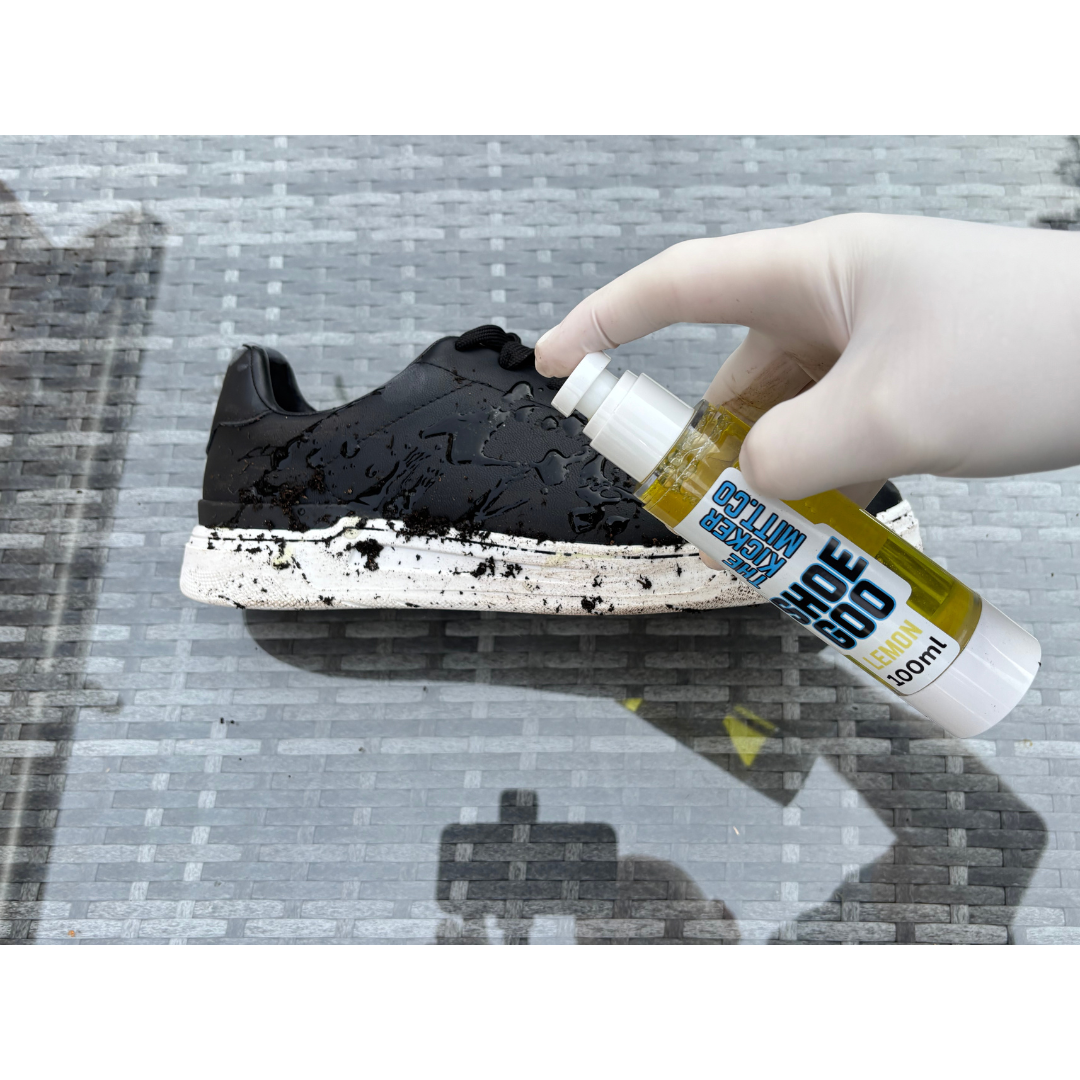The Kicker Mitt Complete Shoe Cleaning Kit including blue mitt, branded microfibre towel, and lemon Shoe Goo cleaner in packaging